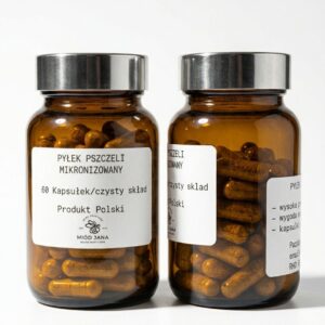 2 butelki, Ciemna szklana butelka z mikronizowanym pyłkiem pszczelim w kapsułkach Miód Jana z widoczną etykietą na białym tle.